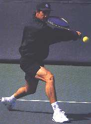 Tennis Player hitting backhand